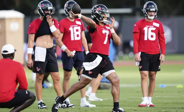 Houston Texans quarterback C.J. Stroud (7) throws during the team's NFL football training camp Wednesday, July 23, 2025, in Houston. (AP Photo/Ashley Landis)