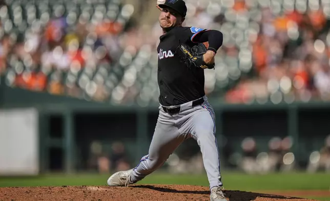 Miami Marlins starting pitcher Janson Junk delivers during the third inning of a baseball game against the Baltimore Orioles, Saturday, July 12, 2025, in Baltimore. (AP Photo/Stephanie Scarbrough)