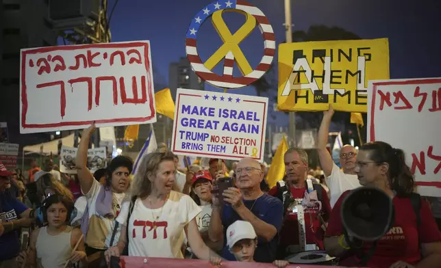 People take part in a protest demanding the end of the war and immediate release of hostages held by Hamas in the Gaza Strip, and against Prime Minister Benjamin Netanyahu's government in Tel Aviv, Israel, Saturday, July 5, 2025. (AP Photo/Ohad Zwigenberg)