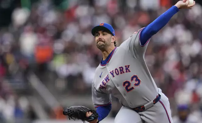 New York Mets pitcher David Peterson throws to a San Francisco Giants batter during the first inning of a baseball game Saturday, July 26, 2025, in San Francisco. (AP Photo/Godofredo A. Vásquez)