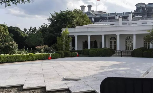 The White House Rose Garden is seen under construction, Wednesday, July 23, 2025, in Washington. (AP Photo/Julia Demaree Nikhinson)