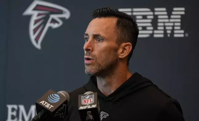 Assistant General Manager Kyle Smith speaks during an Atlanta Falcons training camp, Saturday, July 26, 2025, in Flowery Branch. (AP Photo/Mike Stewart)