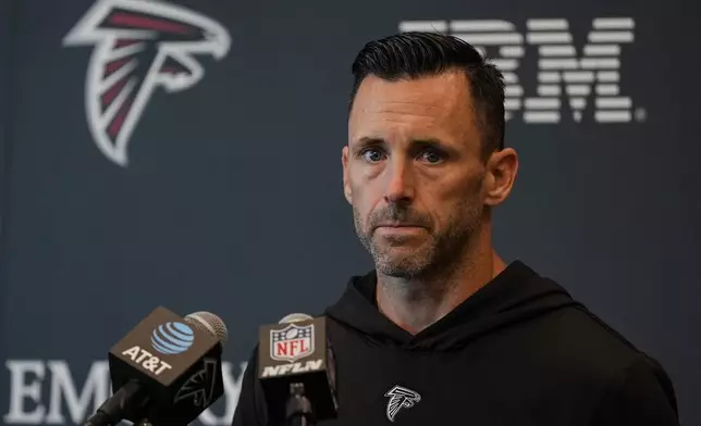Assistant General Manager Kyle Smith speaks during an Atlanta Falcons training camp, Saturday, July 26, 2025, in Flowery Branch. (AP Photo/Mike Stewart)