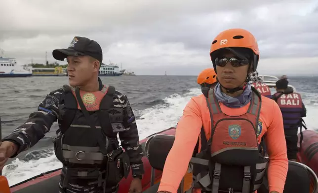 Rescuers search for victims after a ferry sank in the waters off Jembrana, Bali, Indonesia, Friday, July 4, 2025. (AP Photo/Firdia Lisnawati)