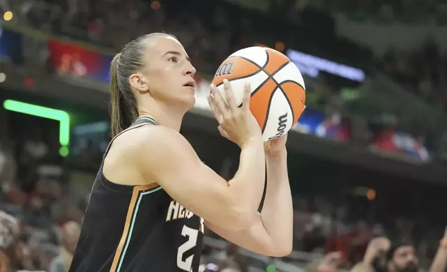 New York Liberty's Sabrina Ionescu shoots during the 3-point contest at the WNBA All-Star basketball weekend, Friday, July 18, 2025, in Indianapolis. (AP Photo/Michael Conroy)