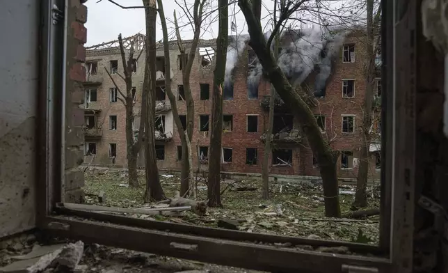 A residential building heavily damaged by a Russian strike in Kyiv, Ukraine, on Thursday, July 31, 2025. (AP Photo/Evgeniy Maloletka)