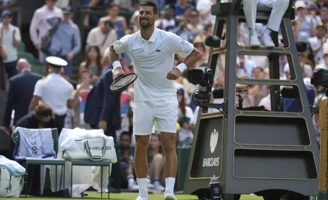 Novak Djokovic of Serbia reacts after beating Daniel Evans of Britain during their second round men's singles match at the Wimbledon Tennis Championships in London, Thursday, July 3, 2025. (AP Photo/Alastair Grant)