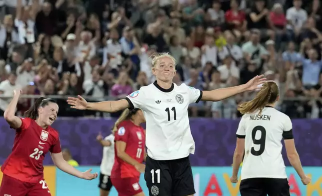 Germany's Lea Schueller celebrates after scoring her side's second goal during the Euro 2025, group C, soccer match between Germany and Poland at Arena St. Gallen in St. Gallen, Switzerland, Friday, July 4, 2025. (AP Photo/Martin Meissner)