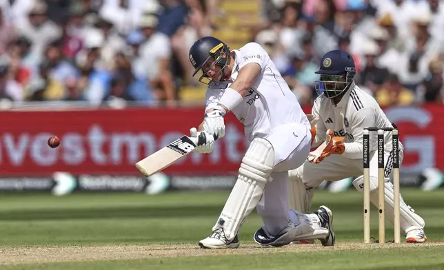 England's Jamie Smith plays a shot on day three of the second cricket test match between England and India at Edgbaston in Birmingham, England, Friday, July 4, 2025. (AP Photo/Scott Heppell)