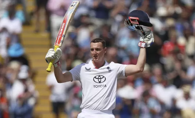 England's Harry Brook celebrates after scoring a century on day three of the second cricket test match between England and India at Edgbaston in Birmingham, England, Friday, July 4, 2025. (AP Photo/Scott Heppell)