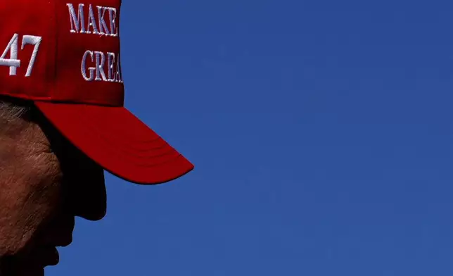 President Donald Trump walks to greet guests during a Fourth of July celebration on the South Lawn of the White House, Friday, July 4, 2025, in Washington. (AP Photo/Julia Demaree Nikhinson)