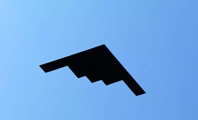 A B-2 bomber conducta a flyover during a Fourth of July celebration at the White House, Friday, July 4, 2025, in Washington. (AP Photo/Rahmat Gul)