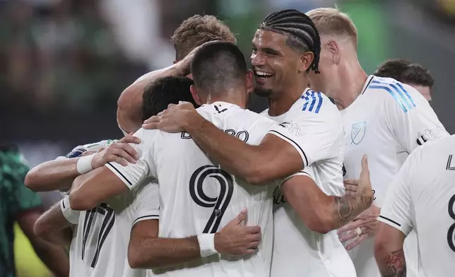 MLS All-Stars' Tai Baribo (9) celebrates with teammates after his goal against Liga MX All-Stars during the MLS All-Star soccer match in Austin, Texas, Wednesday, July 23, 2025. (AP Photo/Eric Gay)