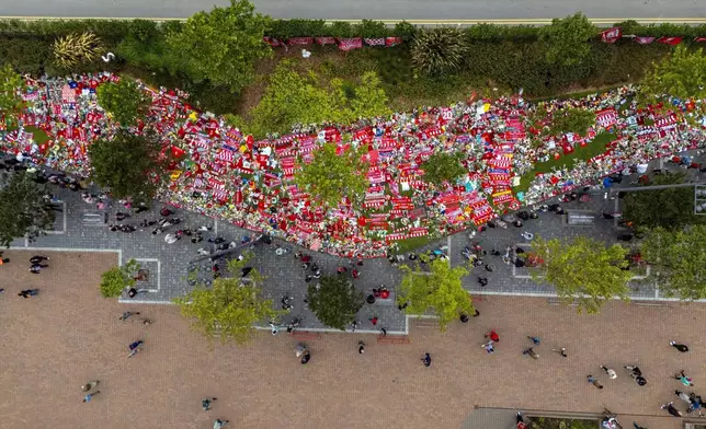 Tributes at Anfield Stadium, home of Liverpool, in memory of Diogo Jota who has died at the age of 28, Saturday, July 5, 2025. (Peter Byrne/PA via AP)