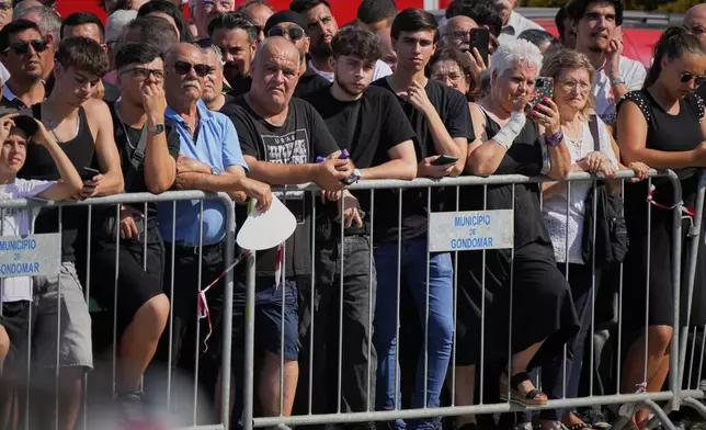 Assistants crowd outside the church during the funeral of Diogo Jota and his brother André Silva, in Gondomar, near Porto, Portugal, on Saturday, July 5, 2025. (AP Photo/Manu Fernandez)