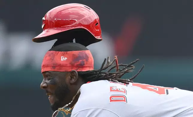 Cincinnati Reds' Elly De La Cruz starts his slide as he steals second base during the fourth inning of a baseball game against the Washington Nationals, Wednesday, July 23, 2025, in Washington. (AP Photo/Nick Wass)