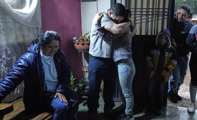 Carlos Uzcategui, one of the Venezuelan migrants deported months ago to El Salvador by the United States under an immigration crackdown, is welcomed home in Lobatera, Venezuela, Wednesday, July 23, 2025. (AP Photo/Ariana Cubillos)