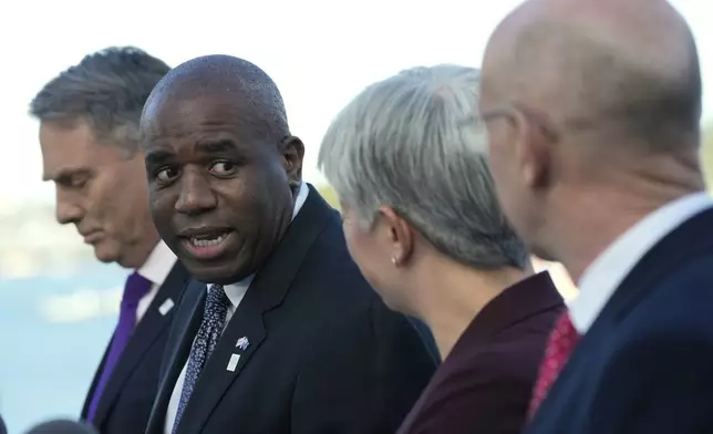 Australian Deputy Prime Minister Richard Marles, left, Britain's Foreign Secretary, Commonwealth and Development Affairs David Lammy, second left, Australian Foreign Minister Penny Wong and Britain's Defense Secretary John Healey, right, hold a press conference at Admiralty House following the Australia-UK Ministerial Consultations (AUKMIN) in Sydney, Australia, Friday, July 25, 2025. (AP Photo/Rick Rycroft)