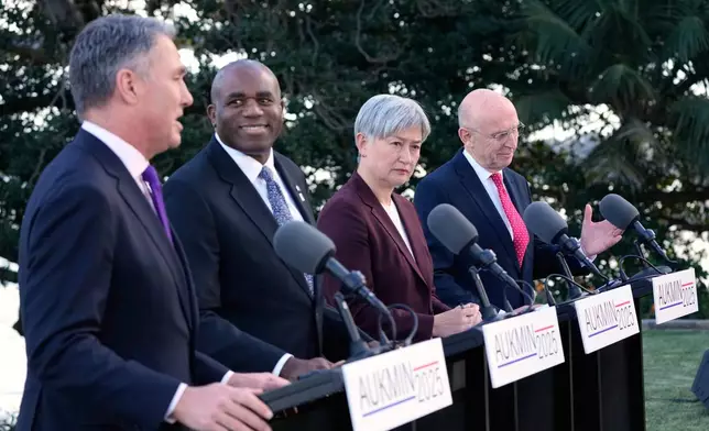 Australian Deputy Prime Minister Richard Marles, left, Britain's Secretary of State for Foreign, Commonwealth and Development Affairs David Lammy, second left, Australian Foreign Minister Penny Wong and Britain's Secretary of State for Defence John Healey, right, hold a press conference at Admiralty House following the Australia-UK Ministerial Consultations (AUKMIN) in Sydney, Australia, Friday, July 25, 2025. (AP Photo/Rick Rycroft)