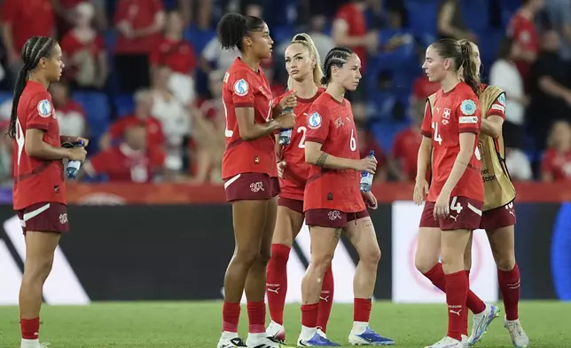 Switzerland players react at the end of the Euro 2025, group A, soccer match between Switzerland and Norway at St. Jakob-Park in Basel, Switzerland, Wednesday, July 2, 2025. (AP Photo/Martin Meissner)