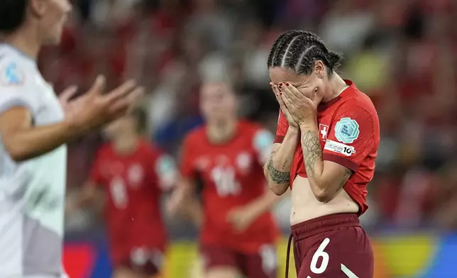 Switzerland's Geraldine Reuteler reacts after failing to score during the Euro 2025, group A, soccer match between Switzerland and Norway at St. Jakob-Park in Basel, Switzerland, Wednesday, July 2, 2025. (AP Photo/Martin Meissner)