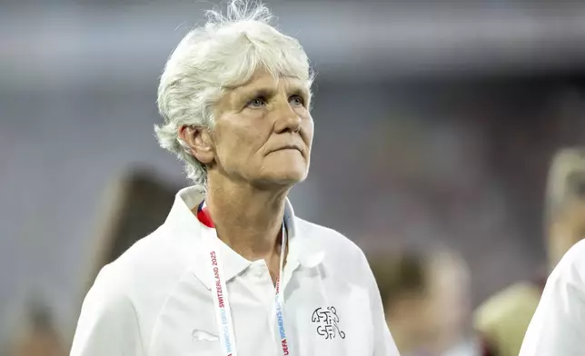 Switzerland's head coach Pia Sundhage heads to the locker room during halftime in the Euro 2025, group A, soccer match between Switzerland and Norway at St. Jakob-Park in Basel, Switzerland, Wednesday, July 2, 2025. (Georgios Kefalas/ Keystone via AP)