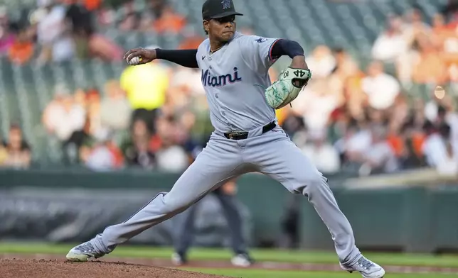 Miami Marlins starting pitcher Edward Cabrera delivers during the first inning of a baseball game against the Baltimore Orioles, Friday, July 11, 2025, in Baltimore. (AP Photo/Stephanie Scarbrough)