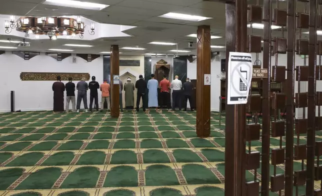 Worshippers pray at the Islamic Center of Southern California on June 16, 2025, in Los Angeles. (AP Photo/Jessie Alcheh)