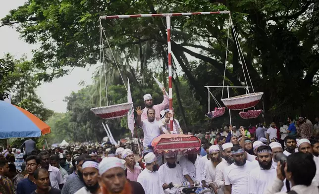 Thousands of supporters of Bangladesh's largest Islamist party Jamaat-e-Islami turn out at a rally in a show of strength ahead of elections expected next year, in Dhaka, Bangladesh, Saturday, July 19, 2025. (AP Photo/Mahmud Hossain Opu)