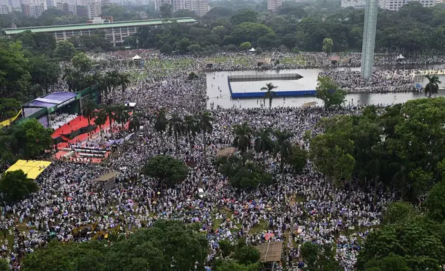 Thousands of supporters of Bangladesh's largest Islamist party Jamaat-e-Islami attend a rally in a show of strength ahead of elections expected next year, in Dhaka, Bangladesh, Saturday, July 19, 2025. (AP Photo/Mahmud Hossain Opu)