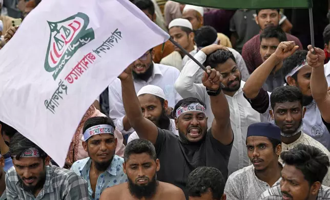 Supporters of Bangladesh's largest Islamist party Jamaat-e-Islami attend a rally in a show of strength ahead of elections expected next year, in Dhaka, Bangladesh, Saturday, July 19, 2025. (AP Photo/Mahmud Hossain Opu)