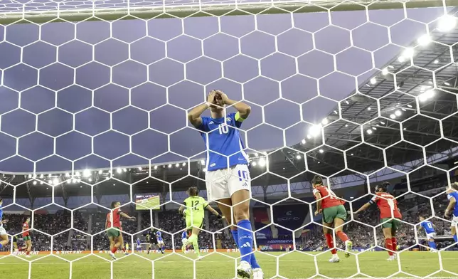 Italy's Cristiana Girelli reacts after failing to score during the Euro 2025, group B, soccer match between Portugal and Italy at Stade de Geneve in Geneva, Switzerland, Monday, July 7, 2025. (Salvatore Di Nolfi/Keystone via AP)