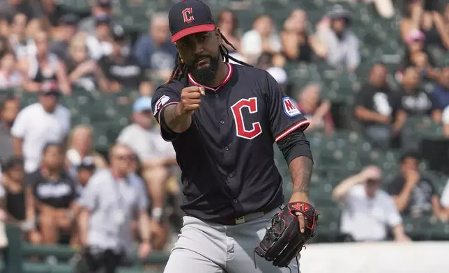 Cleveland Guardians relief pitcher Emmanuel Clase celebrates after his team defeated the Chicago White Sox in a baseball game in Chicago, Sunday, July 13, 2025. (AP Photo/Nam Y. Huh)