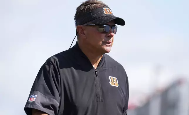 Cincinnati Bengals defensive coordinator Al Golden looks on during practice at the team's NFL football training camp, Sunday, July 27, 2025, in Cincinnati. (AP Photo/Jeff Dean)