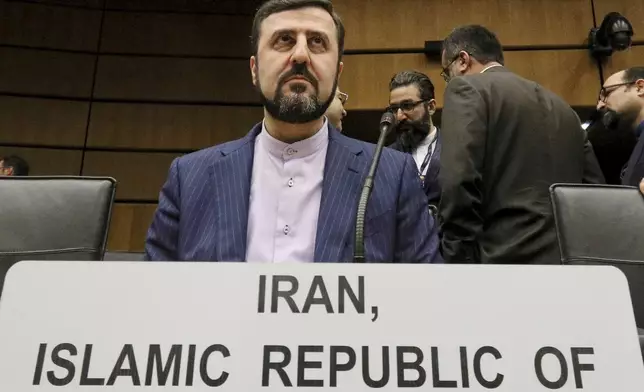 FILE - Ian's Ambassador to the International Atomic Energy Agency, IAEA, Kazem Gharibabadi, waits for the start of the IAEA board of governors meeting at the International Center in Vienna, Austria, Nov. 21, 2019. (AP Photo/Ronald Zak, File)
