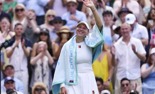 Amanda Anisimova of the U.S. celebrates winning the women's singles semifinal match against Aryna Sabalenka of Belarus at the Wimbledon Tennis Championships in London, Thursday, July 10, 2025.(AP Photo/Kirsty Wigglesworth)