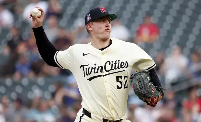 Minnesota Twins pitcher Zebby Matthews delivers a pitch to the Washington Nationals during the first inning of a baseball game Friday, July 25, 2025, in Minneapolis. (AP Photo/Ellen Schmidt)