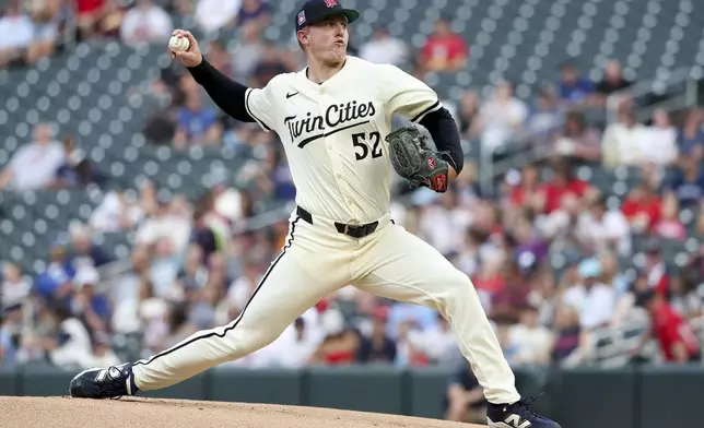Minnesota Twins pitcher Zebby Matthews delivers a pitch to the Washington Nationals during the first inning of a baseball game Friday, July 25, 2025, in Minneapolis. (AP Photo/Ellen Schmidt)
