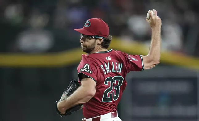Arizona Diamondbacks starting pitcher Zac Gallen records his 1,000th career MLB strikeout as he retires Houston Astros' Brice Matthews for during the fourth inning of a baseball game Monday, July 21, 2025, in Phoenix. (AP Photo/Ross D. Franklin)