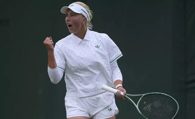 Clara Tauson of Denmark reacts during her women's singles third round match against Elena Rybakina of Kazakhstan at the Wimbledon Tennis Championships in London, Saturday, July 5, 2025.(AP Photo/Kin Cheung)
