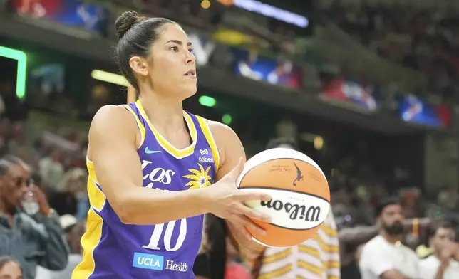 Los Angeles Sparks's Kelsey Plum shoots during the 3-point contest at the WNBA All-Star basketball weekend, Friday, July 18, 2025, in Indianapolis. (AP Photo/Michael Conroy)