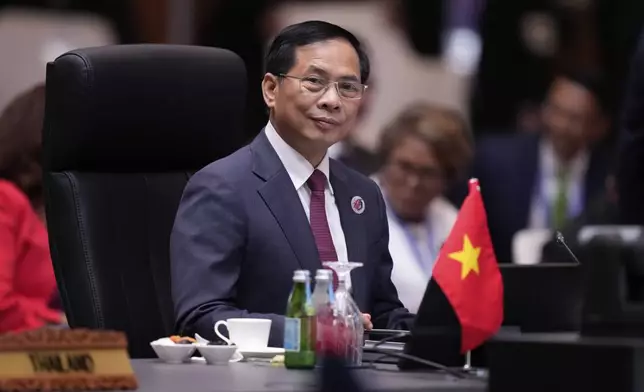 Vietnam's Foreign Minister Bui Thanh Son attends a plenary session of the Association of Southeast Asian Nations (ASEAN) Foreign Ministers' meeting at the Convention Centre in Kuala Lumpur, Malaysia, Wednesday, July 9, 2025. (AP Photo/Vincent Thian)