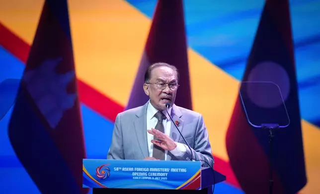 Malaysia's Prime Minister Anwar Ibrahim delivers his keynote address during the opening ceremony of the Association of Southeast Asian Nations (ASEAN) Foreign Ministers' meeting and related meetings at the Convention Centre in Kuala Lumpur, Malaysia, Wednesday, July 9, 2025. (AP Photo/Vincent Thian)