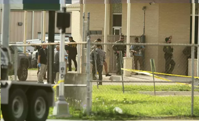 Law enforcement operates at the scene at Rio Grande Valley Border Patrol Sector Annex, Monday, July 7, 2025, McAllen, Texas. (Delcia Lopez/The Monitor via AP)