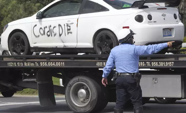 Vehicle belonging to suspect car is towed away from the scene at Rio Grande Valley Border Patrol Sector Annex, Monday, July 7, 2025, McAllen, Texas. (Delcia Lopez/The Monitor via AP)