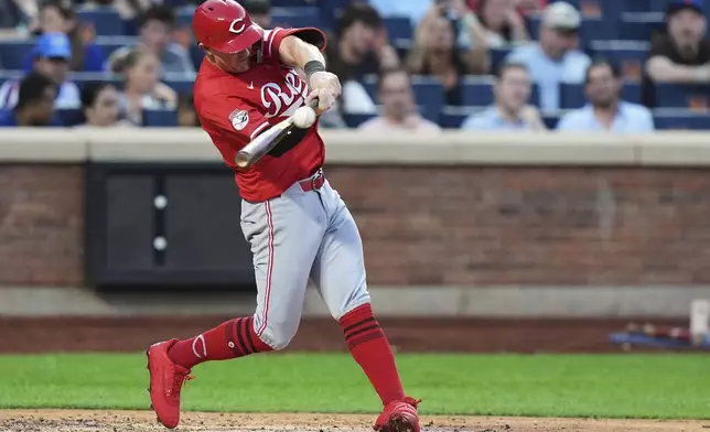 Cincinnati Reds' Austin Hays hits a home run during the fourth inning of a baseball game against the New York Mets Friday, July 18, 2025, in New York. (AP Photo/Frank Franklin II)