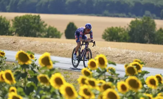Netherlands' Frank van den Broek rides during the ninth stage of the Tour de France cycling race over 174.1 kilometers (108 miles) with start in Chinon and finish in Chateauroux, France, Sunday, July 13, 2025. (AP Photo/Mosa'ab Elshamy)