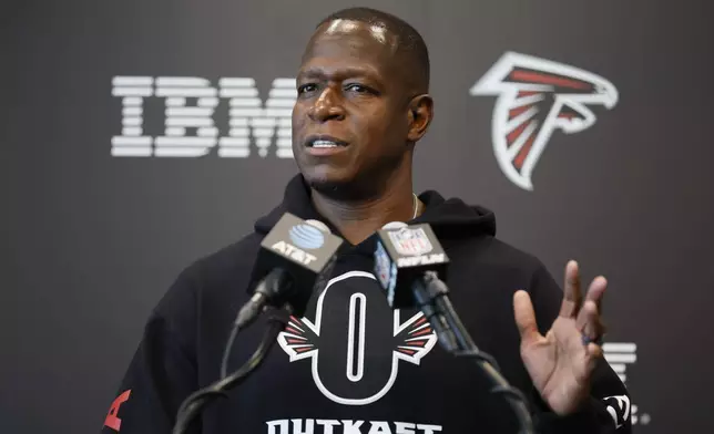 Atlanta Falcons Coach Raheem Morris speaks to the media prior to the first open training NFL football camp on Thursday, July 24, 2022, in Flowery Branch, Ga. (Miguel Martinez/Atlanta Journal-Constitution via AP)