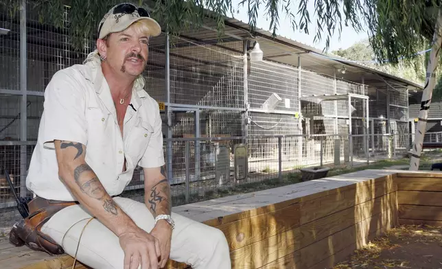 FILE - Joseph Maldonado answers a question during an interview at the zoo he runs in Wynnewood, Okla., on Aug. 28, 2013. (AP Photo/Sue Ogrocki, File)
