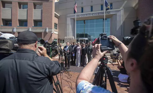 A statement is made after the Bryan Kohberger sentencing Wednesday, July 23, 2025, outside of the Ada County Courthouse in Boise, Idaho. (AP Photo/Drew Nash)